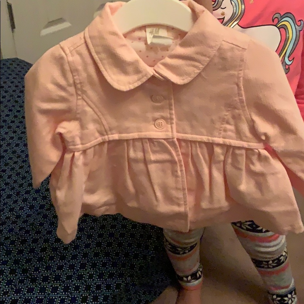 A beautiful baby peacoat age 4-6 months.